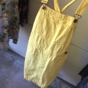 Yellow denim overalls